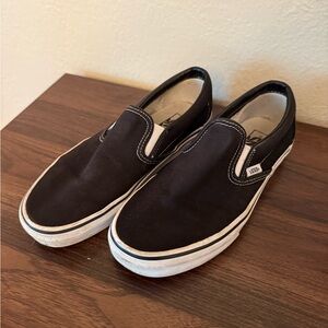 Vans Black and White Slip-On Loafers with Classic Design